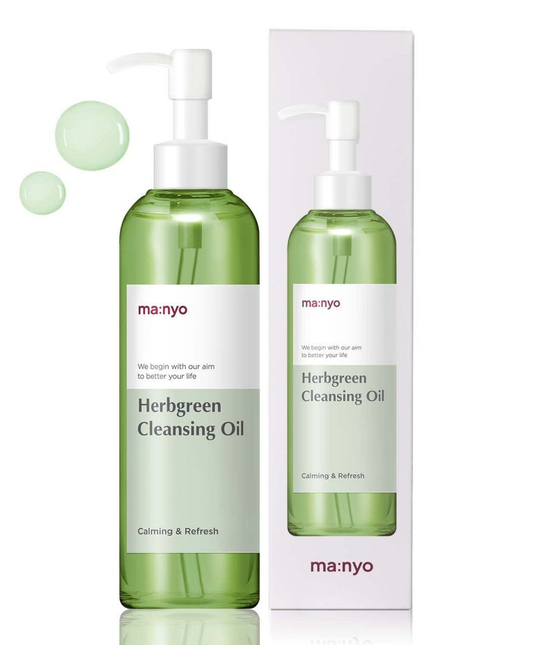 Зелена пляшечка з білою етикеткою та білим дозатором Ma:nyo Herb Cleansing Oil поряд з коробкою від цього засобу стоять на білому фоні, біля дозатора — зелені кульки.