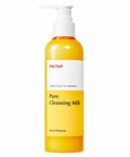Жовта пляшечка засобу Ma:nyo Pure Cleansing Milk з білим дозатором на білому фоні.