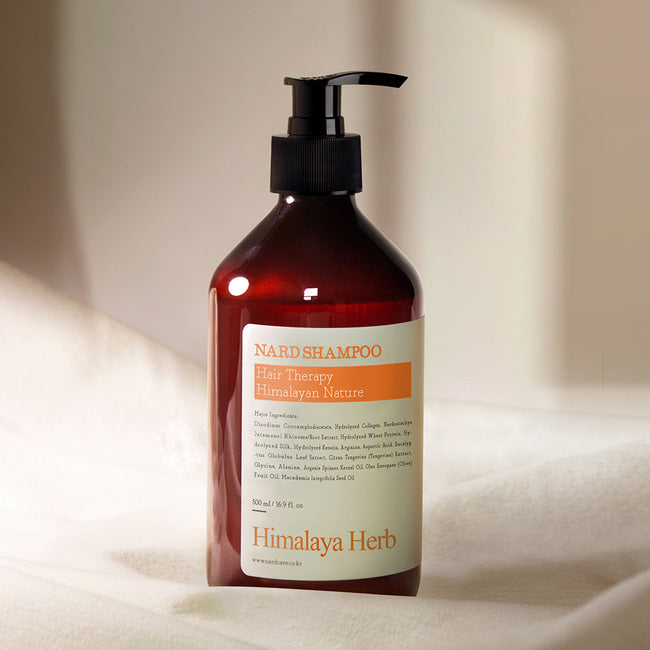 Флакон шампуню NARD Shampoo Tangerine Eucalyptus на світлій м’якій тканині, 500 мл