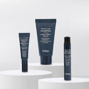 Три мініатюрні засоби на білих подіумах: Solep (Miniature) Premier Hi-gro Ampoule Pack, Solep (Miniature) Premier Hi-gro Ampoule Treatment, Solep (Miniature) Premier Hi-gro Shampoo. Ці продукти розташовані на білому фоні.