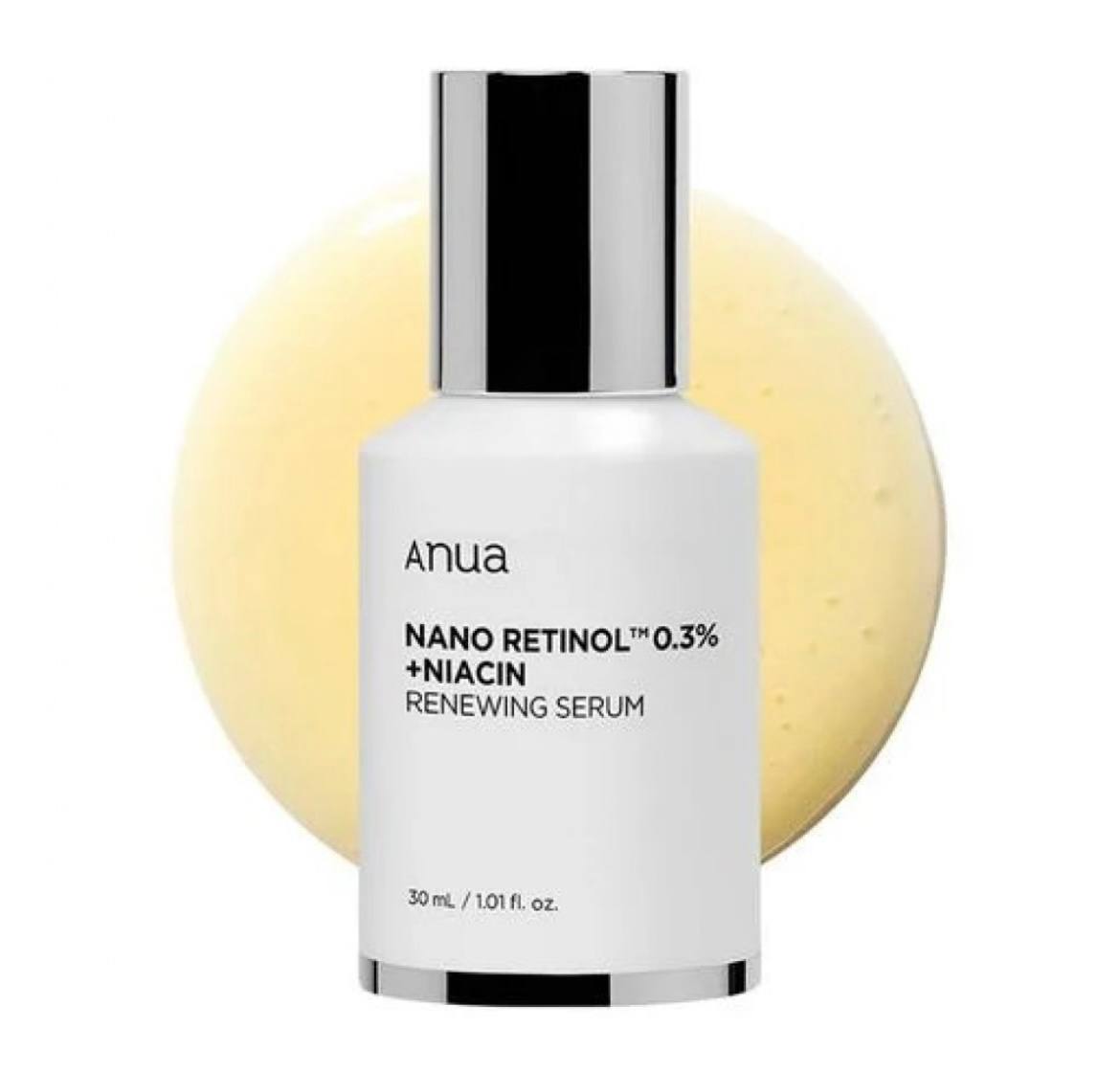 Біла пляшечка з темно-сірою кришечкою засобу Anua Nano Retinol 0,3% + Niacin Renewing стоїть на фоні, на якому видно текстуру засобу.