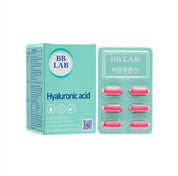 Бірюзова коробка з колагеном BB Lab Hyaluronic Acid стоїть поряд з пластинкою капсул.