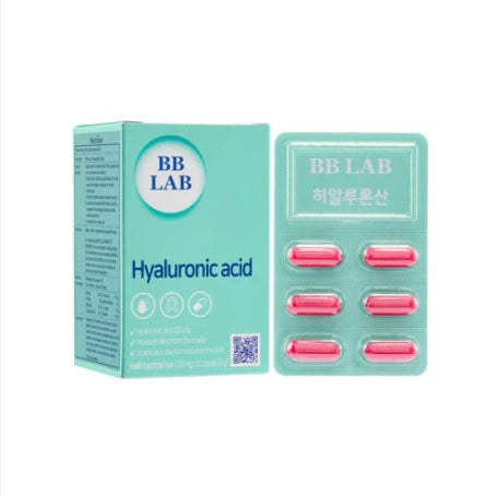 Бірюзова коробка з колагеном BB Lab Hyaluronic Acid стоїть поряд з пластинкою капсул.