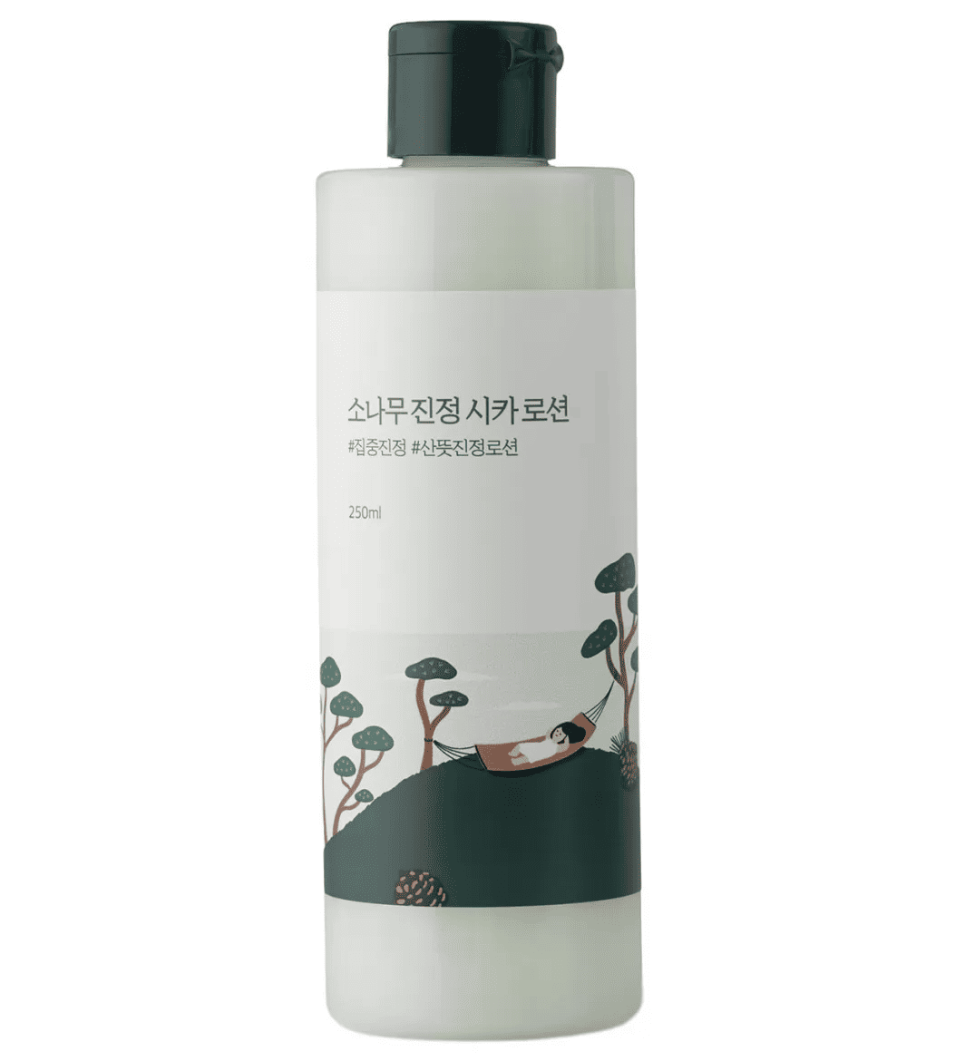 Світло-зелена баночка лосьйону ROUND LAB Pine Calming Cica Lotion стоїть на білому фоні.