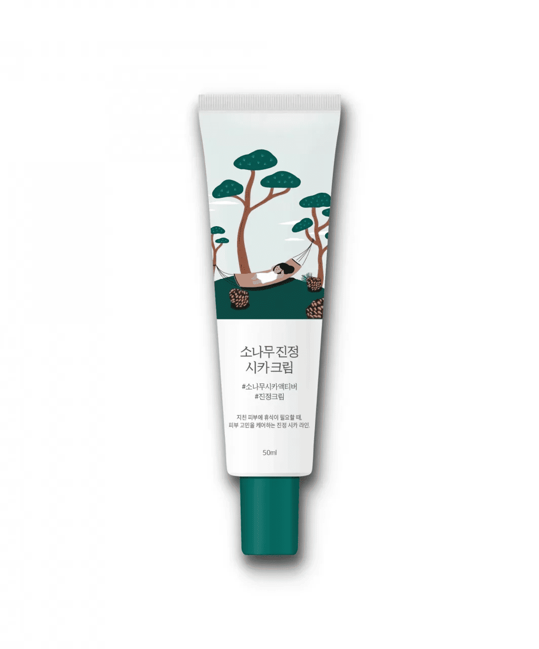 Тюбик крему Round Lab Pine Calming Cica Cream на білому фоні. На тюбику зображені дерева, дівчина на гамаку та шишки на траві.