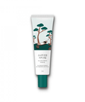 Тюбик крему Round Lab Pine Calming Cica Cream на білому фоні. На тюбику зображені дерева, дівчина на гамаку та шишки на траві.